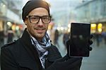 Urban Man Holdin Tablet Computer On Street Stock Photo