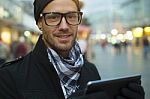 Urban Man Holdin Tablet Computer On Street Stock Photo