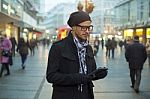 Urban Man Holdin Tablet Computer On Street Stock Photo