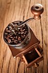 Vintage Manual Coffee Grinder With Coffee Beans Stock Photo