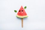 Watermelon Slice Popsicles And Paper Mint On White Wooden Backgr Stock Photo