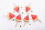 Watermelon Slice Popsicles On White Background Stock Photo