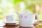 White Porcelain Set For Tea Or Coffee On Wooden Table Stock Photo