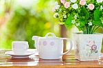 White Porcelain Set For Tea Or Coffee On Wooden Table Stock Photo