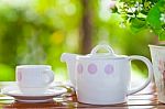 White Porcelain Set For Tea Or Coffee On Wooden Table Stock Photo