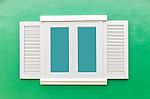 White Window Classic Vintage On The Color Green Wall Background Stock Photo