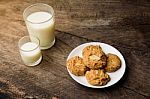 Whole Wheat Almond Cookies With A Glass Of Milk Stock Photo