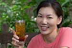 Woman And Cola Stock Photo