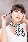 Woman And Cosmetic Make Up Stock Photo