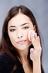 Woman Applying Make Up Stock Photo