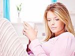 Woman At Home Holding Cup Of Tea Stock Photo