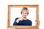 Woman Behind Wooden Frame Pointing  You Out Stock Photo