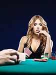 Woman Doubt In Gambling Match Stock Photo