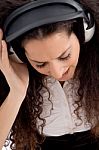 Woman Enjoying Music Stock Photo