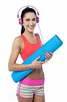 Woman Enjoying Music After Workout Stock Photo