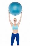 Woman Exercising With Gymnastic Ball Stock Photo