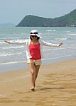 Woman Full Length With Relaxing On The Beach Stock Photo