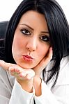 Woman Giving Flying Kiss Stock Photo