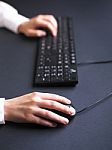 Woman Hand Typing On Keyboard Stock Photo