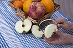 Woman Hands Peeling An Apple With A Knife Stock Photo