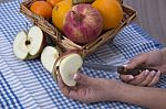 Woman Hands Peeling An Apple With A Knife Stock Photo