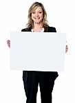 Woman Holding A Billboard Stock Photo