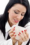 Woman Holding A Rock Stock Photo