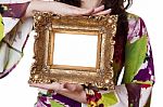 Woman Holding An Picture Frame Stock Photo