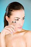 Woman Holding Tool For Eyelash Stock Photo