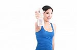 Woman Holding Water Bottle Stock Photo