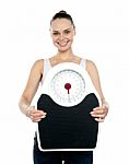 Woman Holding Weighing Scales Stock Photo