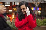 Woman In Red Coat With Mobile Phone In Hands, Smartphone, Urban Stock Photo