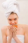 Woman In Spa Holding Bowl Near Mouth Stock Photo