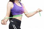 Woman In Sport Bra Measuring Her Body With Tape Isolated On Whit Stock Photo