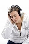 Woman Listening To Music With Closed Eyes Stock Photo