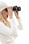 Woman Looking Through Binoculars Stock Photo