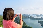 Woman On Peak Take Photos Stock Photo