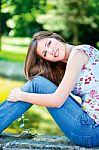 Woman On Sunny Day In Park Stock Photo