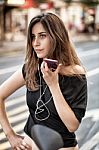 Woman On The Phone In The Street Stock Photo