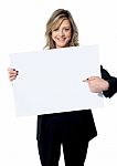 Woman Pointing At Billboard Stock Photo