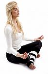 Woman Practicing Yoga Stock Photo