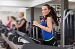 Woman Running On Treadmill Stock Photo