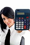 Woman Showing Calculator Stock Photo