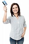 Woman Showing Her Cash Card Stock Photo