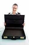 Woman Showing Suitcase Stock Photo