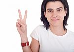 Woman Showing Victory Sign Stock Photo