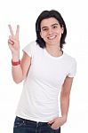 Woman Showing Victory Sign Stock Photo