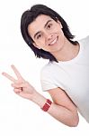 Woman Showing Victory Sign Stock Photo