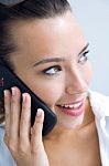 Woman Talking On The Mobile Phone Stock Photo