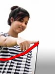 Woman Touching A Businesss Graph Stock Photo